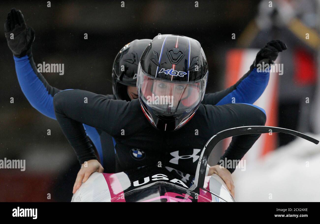 Driver Bree Schaaf (front) and pusher Emily Azevedo of the U.S. compete  during the FIBT women's