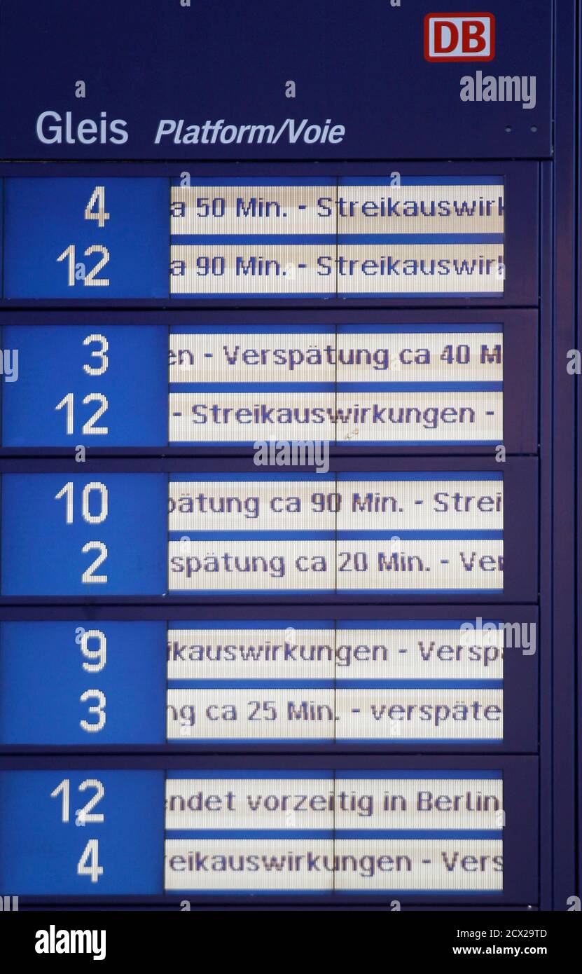An electronic timetable at the Duisburg Central Station displays train  delays due to the two-hour warning strike calling for higher wages for  employees of Germany's rail operator Deutsche Bahn (DB) represented by
