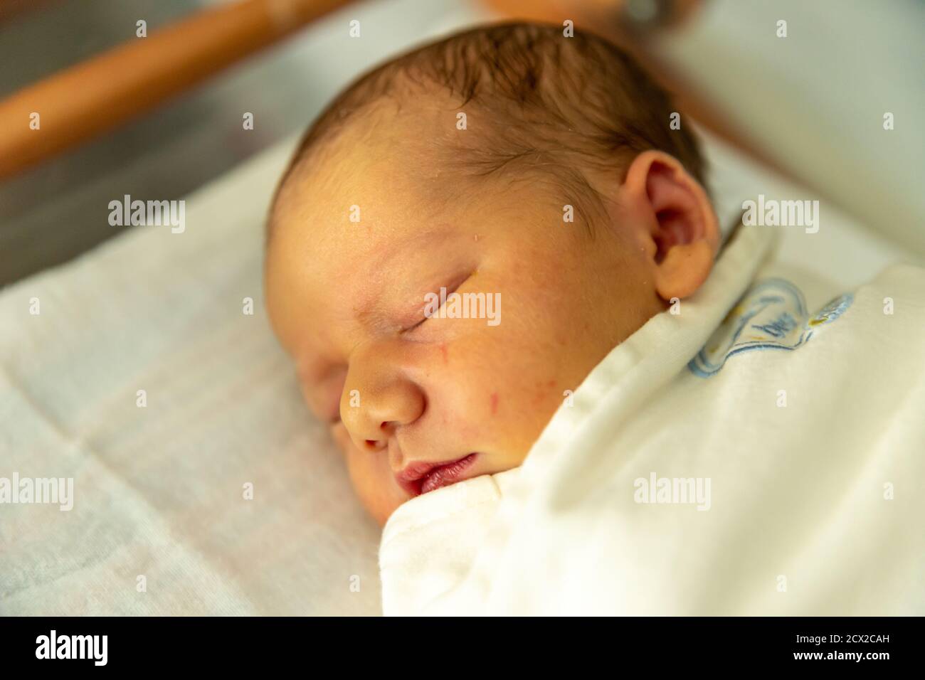 Beautiful newborn baby sleeping peacefully. Stock Photo