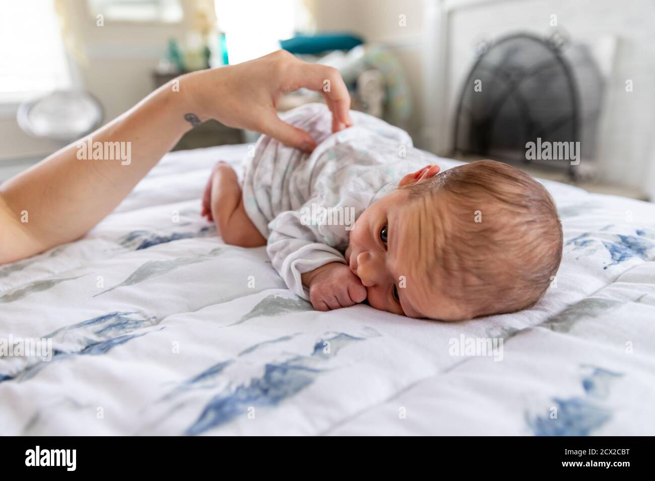 Boy laying on stomach hires stock photography and images Alamy