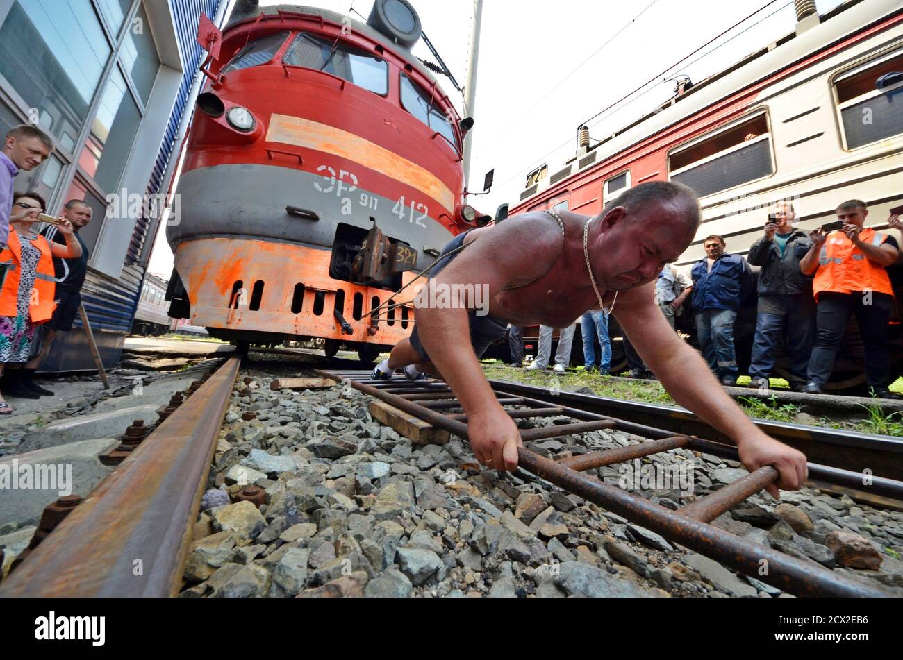 Man pulls train hi-res stock photography and images - Alamy
