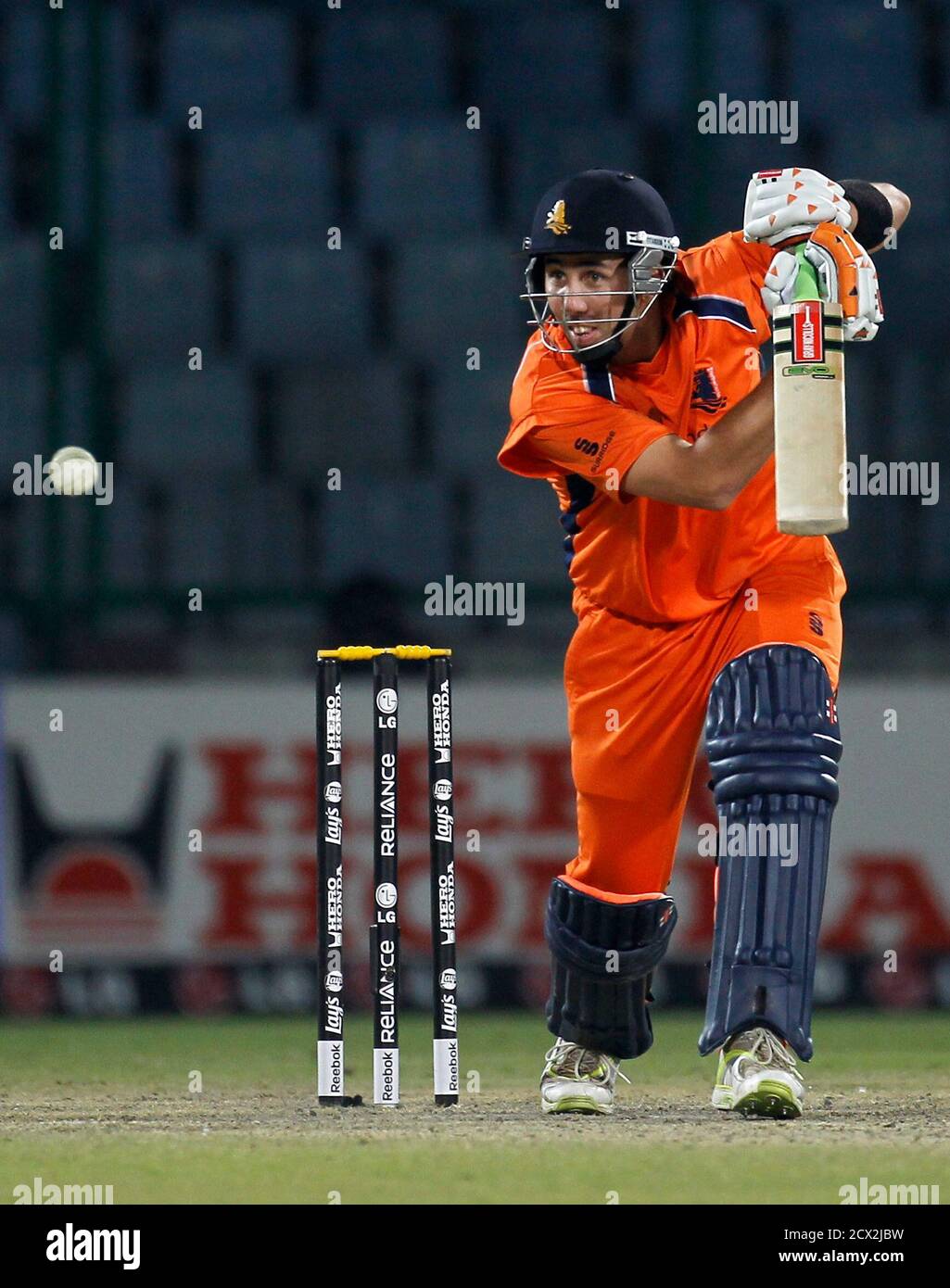 Netherlands' Tom Cooper plays a shot during their ICC Cricket World Cup  group B match against the West Indies in New Delhi February 28, 2011.  REUTERS/Adnan Abidi (INDIA - Tags: SPORT CRICKET