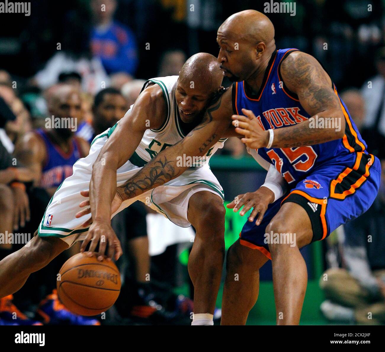New York Knicks guard Anthony Carter (R) knocks the ball away from Boston  Celtics guard Ray Allen during the second half of Game 1 of their NBA  Eastern Conference playoff series in
