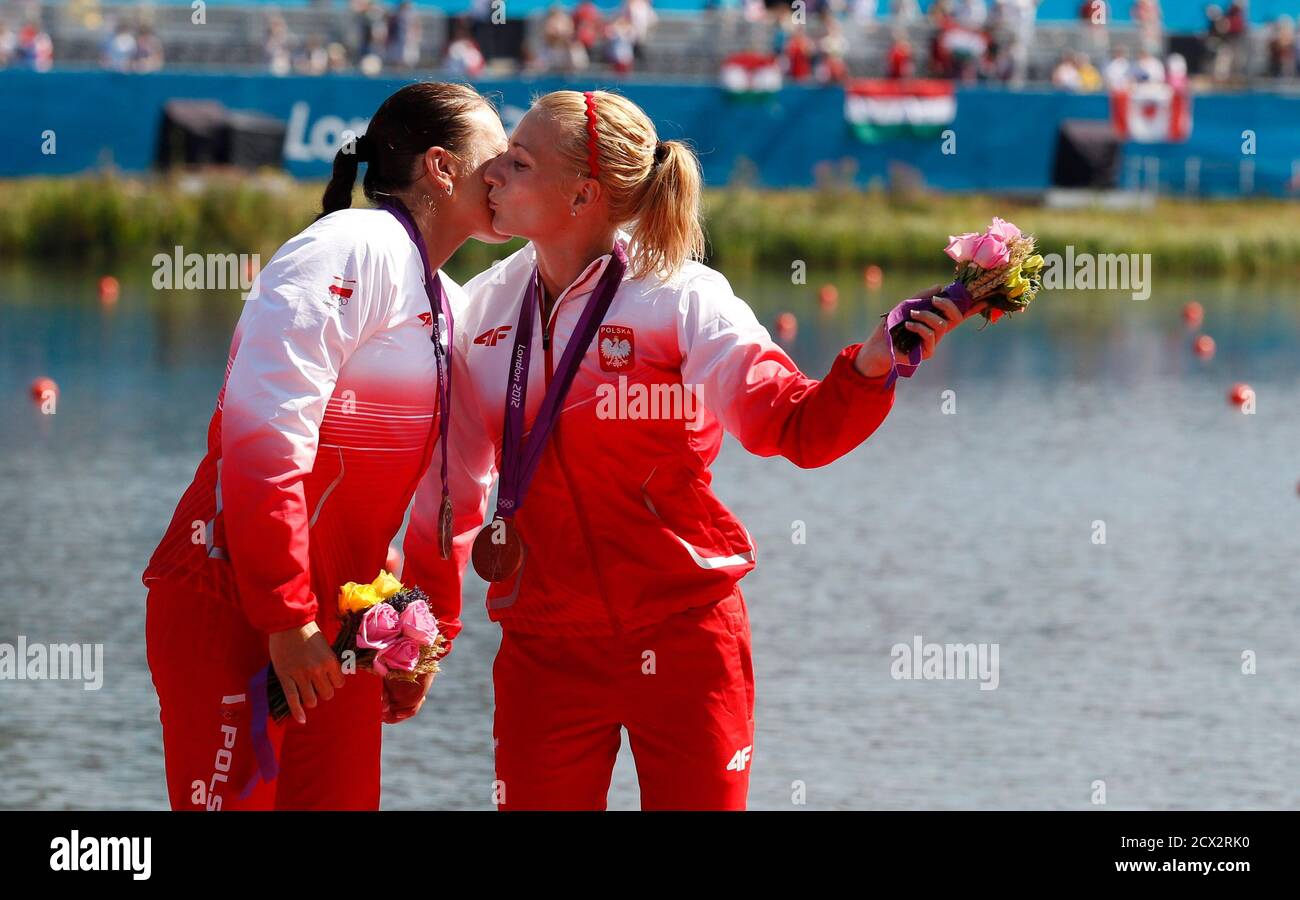 Poland S Bronze Medallists Karolina Naja R And Beata Mikolajczyk Kiss On The Podium During The Victory Ceremony For The Women S Kayak Double K2 500m At Eton Dorney During The London 2012 Olympics