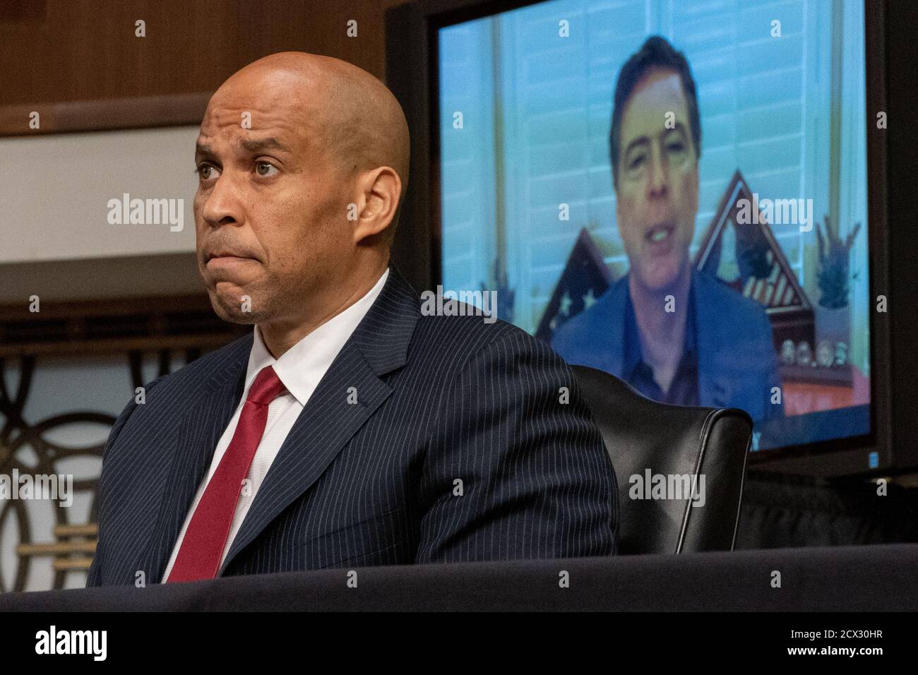 Washington, United States. 30th Sep, 2020. U.S. Sen. Cory Booker (D-NJ) asks questions to former FBI Director James Come as he testifies remotely before the Senate Judiciary Committee during an oversight hearing to examine the Crossfire Hurricane Investigation in Washington DC., on Wednesday, September 30, 2020. Photo by Ken Cedeno/UPI Credit: UPI/Alamy Live News Stock Photo