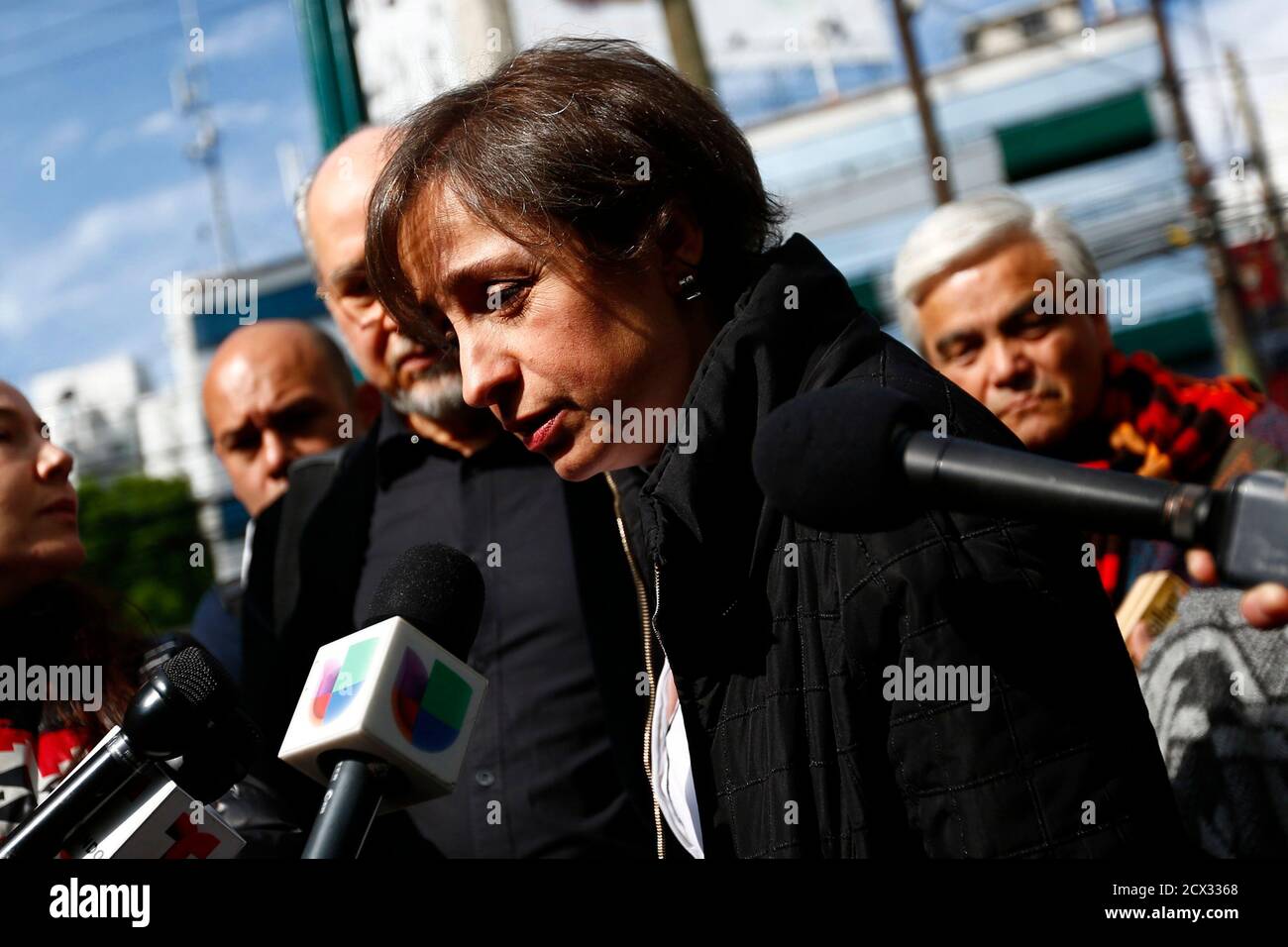 Mexican journalist Carmen Aristegui speaks with journalists outside MVS  radio station in Mexico City March 16, 2015. Aristegui, whose team revealed  a conflict-of-interest scandal ensnaring President Enrique Pena Nieto last  year, has