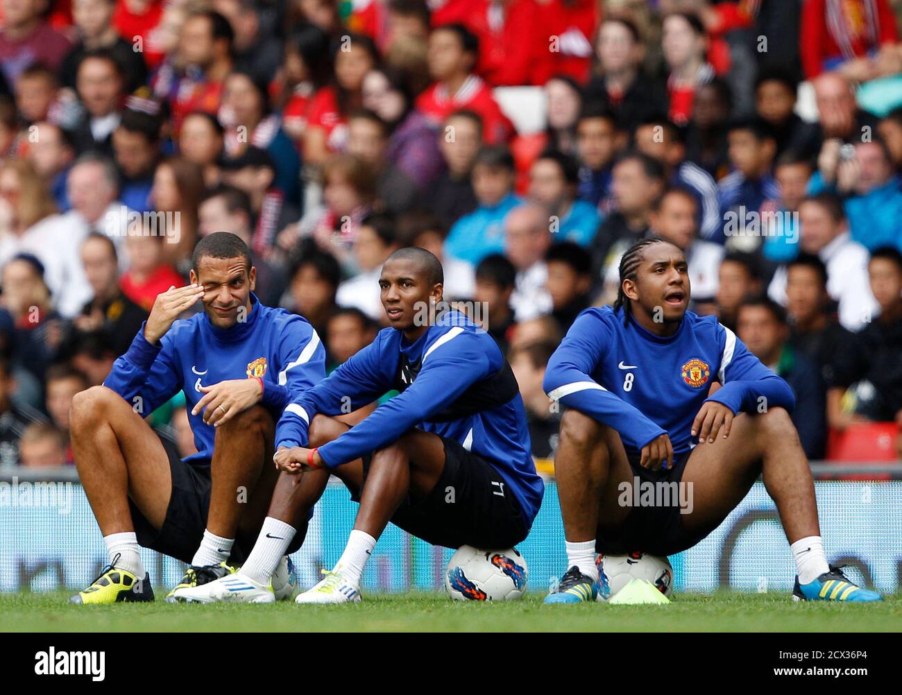 Manchester United S Rio Ferdinand Ashley Young And Anderson L R Watch A Soccer Training Session At Old Trafford In Manchester August 6 11 Reuters Darren Staples Britain s Sport Soccer Stock Photo Alamy