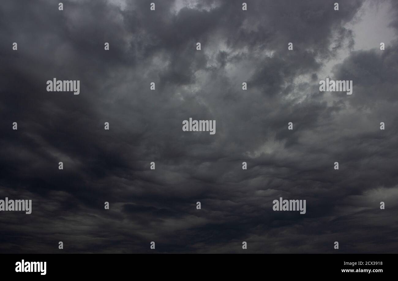 The big powerful storm clouds before a thunder-storm Stock Photo