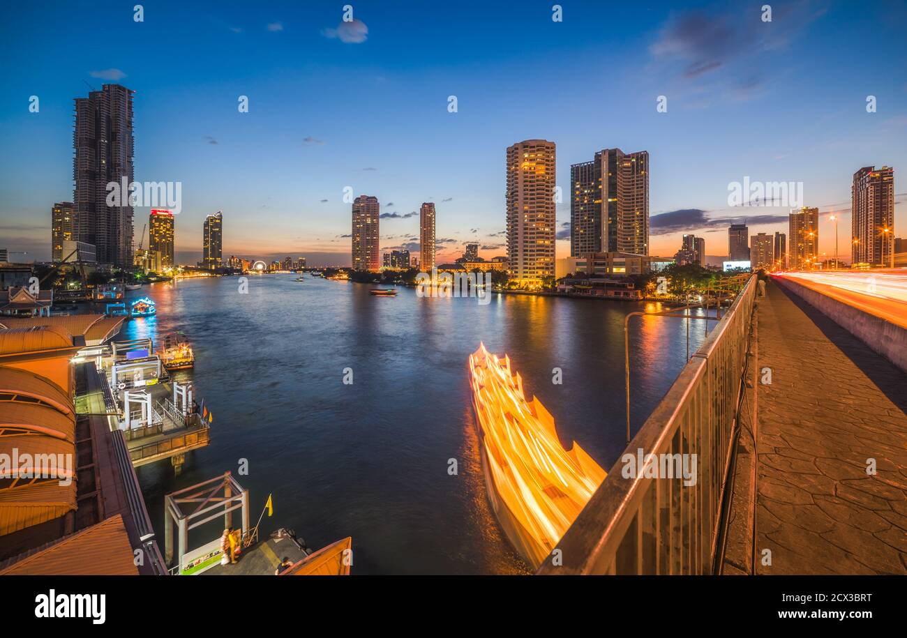 Skyscrapers and Light Trails of Traffic on the Chao Phraya River in ...