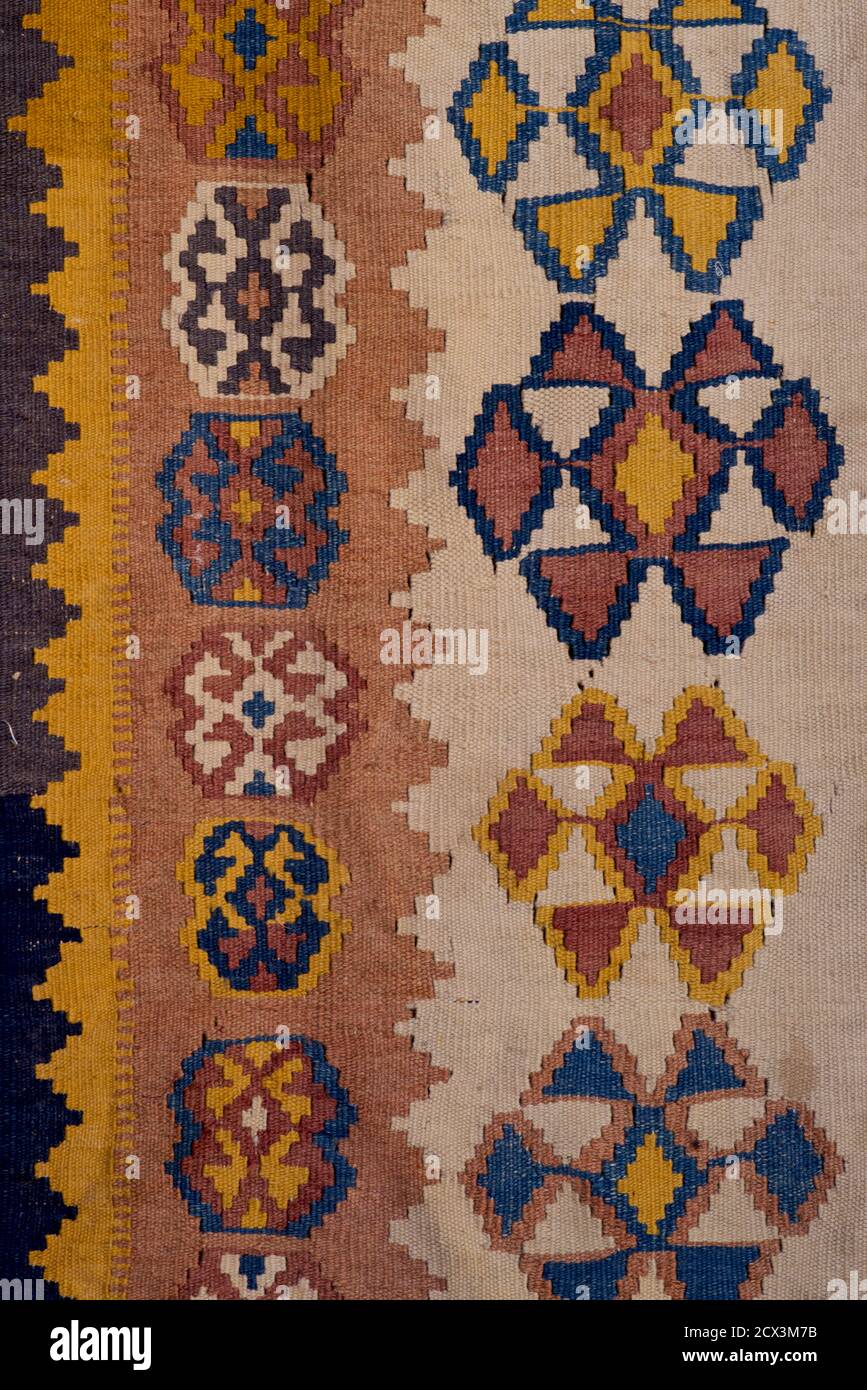 Detail of Persian carpet with geometric patterning, Iran Stock Photo