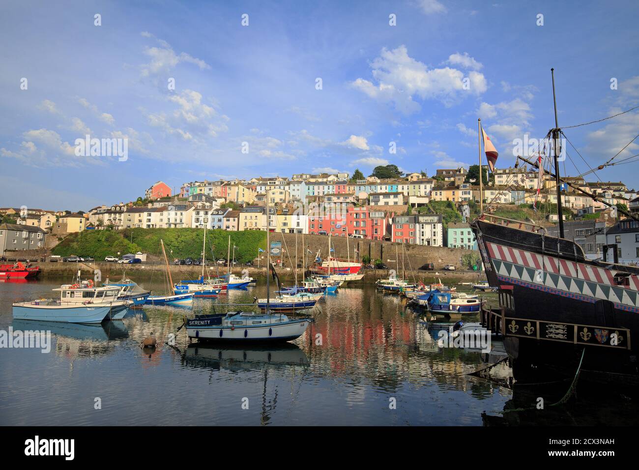Brixham Harbour in the English Riviera with colourful houses and small
