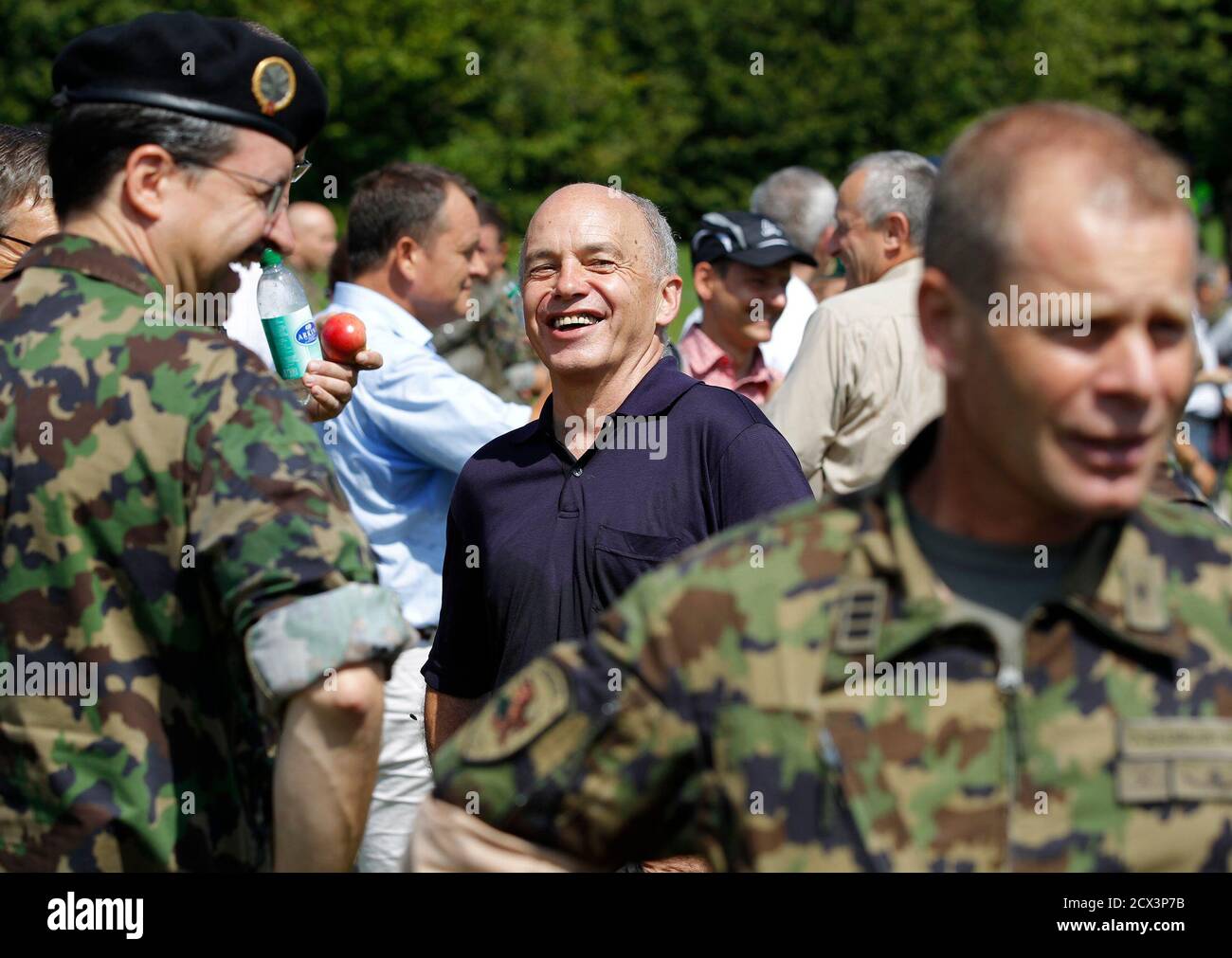 Swiss Defence Minister Ueli Maurer Meets His Staff During A Cadre Day Of  The Defence Department On A Field Outside Magglingen August 19, 2011.  Reuters/Ruben Sprich (Switzerland - Tags: Politics Military Stock
