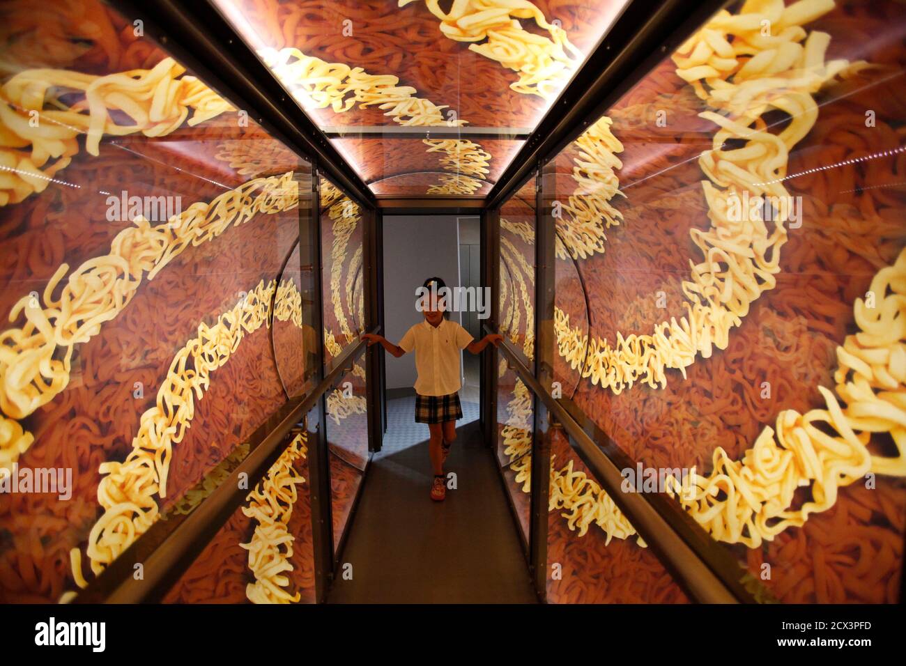 A girl plays at "Cup Noodles Park", an interactive attraction where