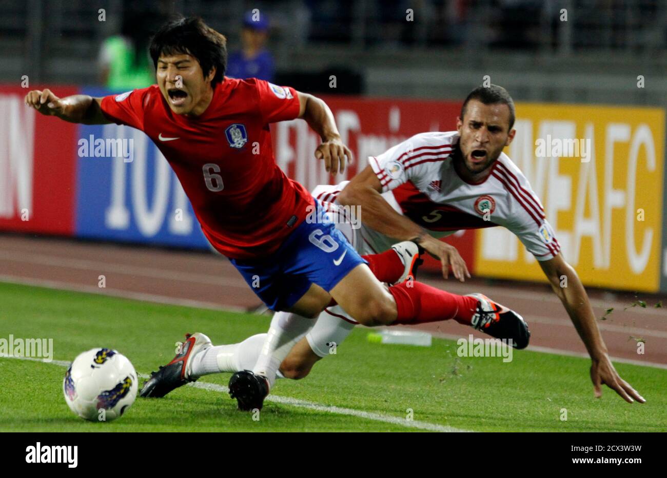 South Korea S Park Joo Ho Fights For The Ball With Lebanon S Ramez Dayoub During Their 14 Brazil World Cup Qualifying Soccer Match In Goyang North Of Seoul June 12 12 Reuters Kim Hong Ji South