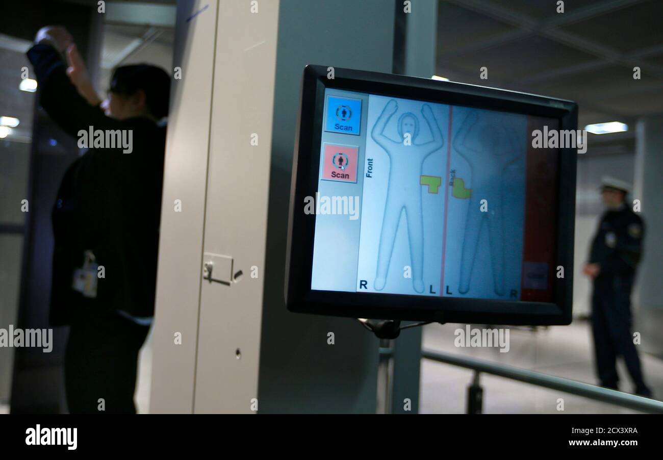 Melanie Kostka, press spokeswomen of German border police "Bundespolizei"  is scanned in a body scanner at Fraport airport in Frankfurt, November 23,  2012. The first full body scanner to be used in