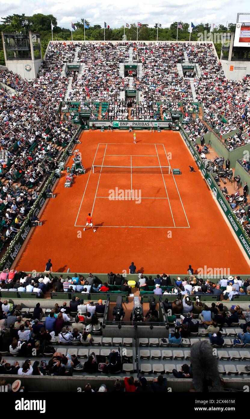 A general view shows the Suzanne Lenglen court during the men's singles  match between Novak Djokovic of Serbia and Gilles Muller of Luxembourg at  the French Open tennis tournament at the Roland
