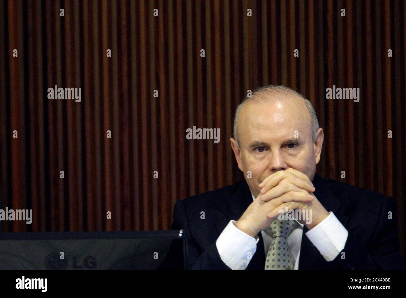 Brazil's Finance Minister Guido Mantega attends a meeting with a political council in Brasilia August 29, 2011. Brazilian President Dilma Rousseff will outline a tight budget for next year on Monday, government sources said, reaffirming her commitment to spending control and paving the way for interest rate cuts.    REUTERS/Ueslei Marcelino (BRAZIL - Tags: POLITICS BUSINESS) Stock Photo