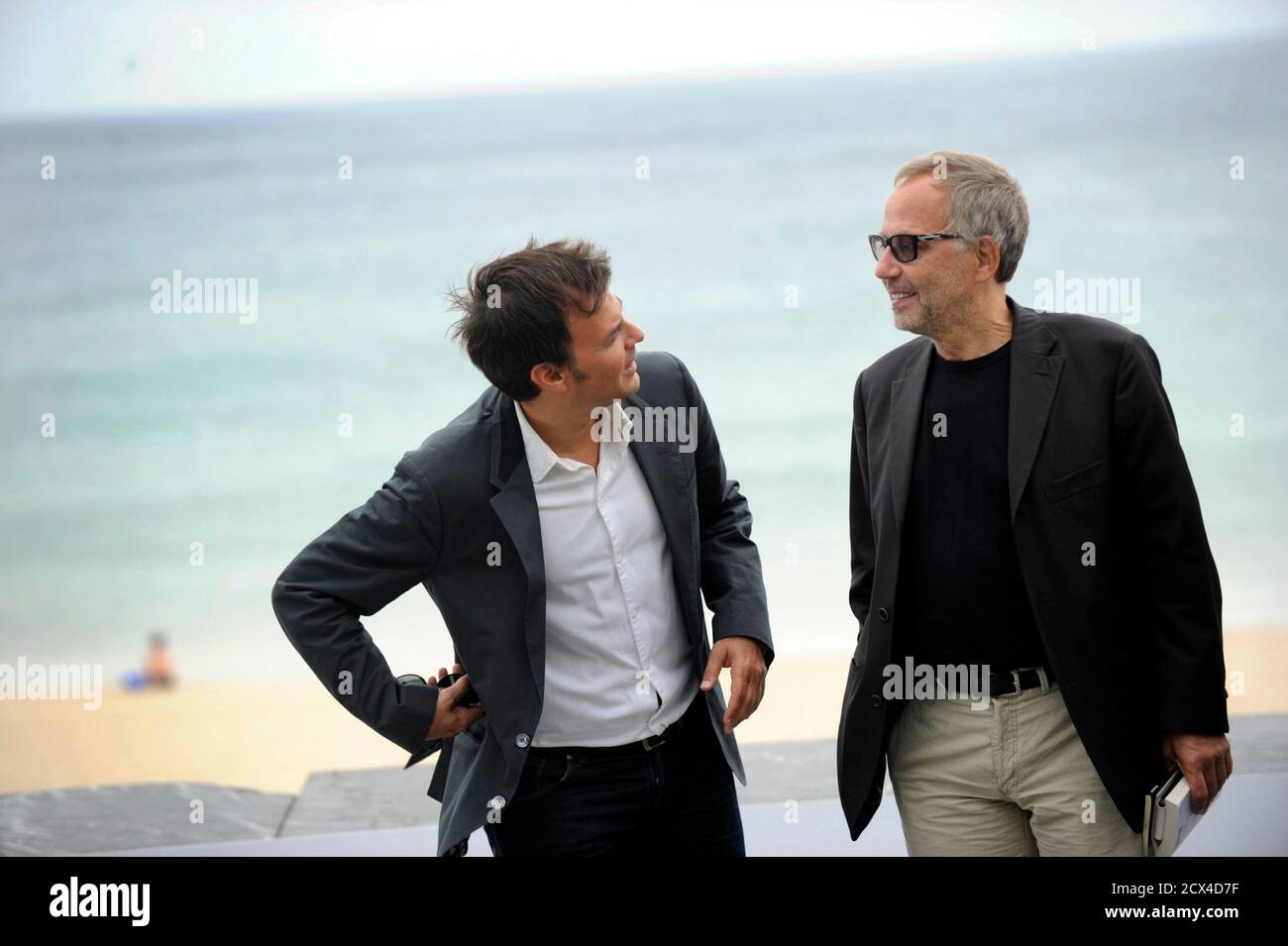 French Director Francois Ozon L And Actor Fabrice Luchini Participate In A Photocall To Promote Dans La Maison In The House About A Young Writing Student S Observations Of The Emotional Mechanics Of