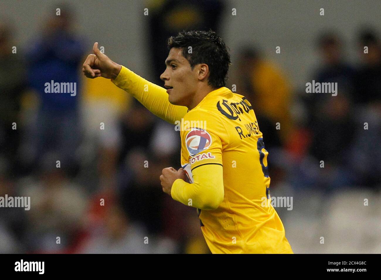 Raul Jimenez of Mexico's Club America celebrates his goal against Panama's  Sporting San Miguelito during their CONCACAF Champions League soccer match  at Azteca stadium in Mexico City September 17, 2013. REUTERS/Edgard Garrido  (