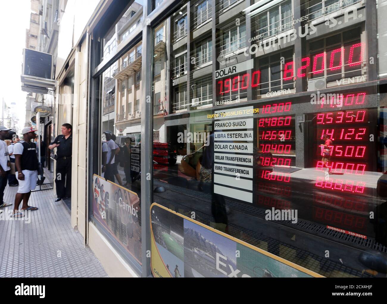 Exchange of dollars for Argentine pesos in the face of devaluation Stock  Photo - Alamy