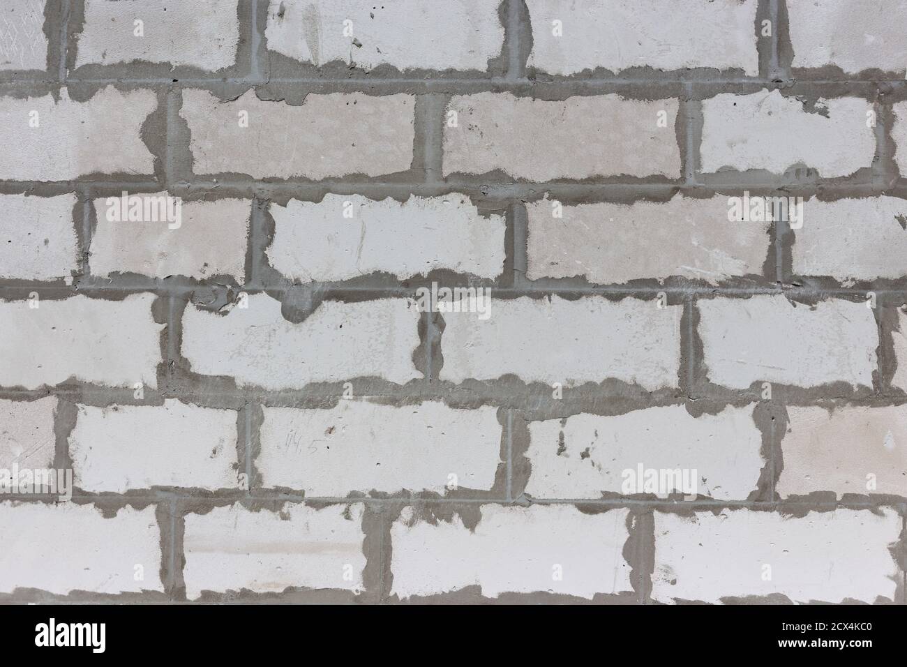 Gray brick wall with mortar joints Stock Photo Alamy