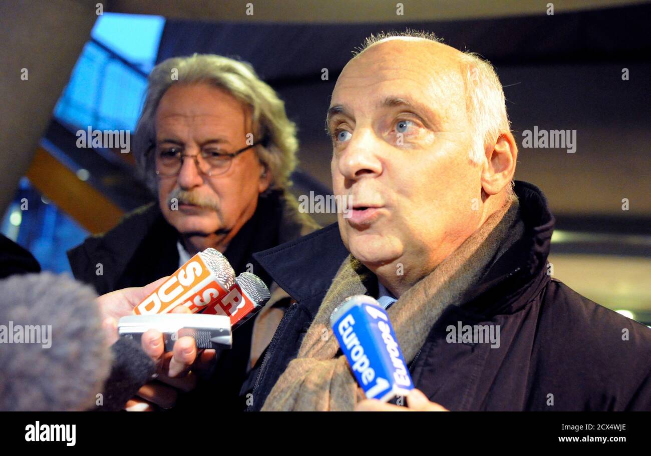 Pierre Cornut-Gentille (R), lawyer of French photographer Francois-Marie  Banier and Jean-Alain Michel (L), lawyer of Martin d'Orgeval, speak with  journalists as they leave the courthouse in Bordeaux December 14, 2011.  Banier and