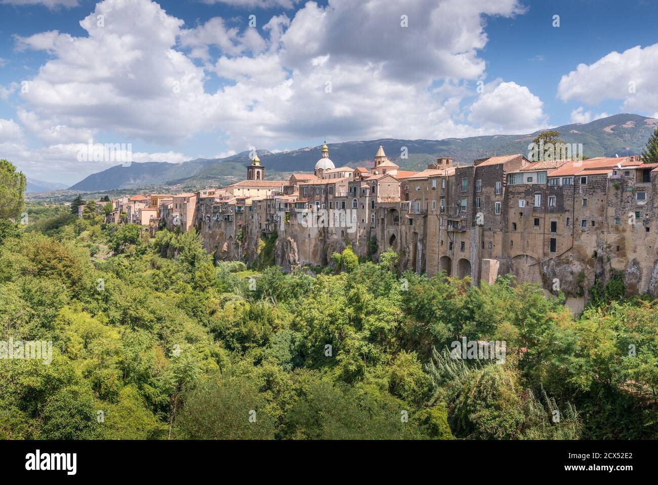 View of Sant'Agata de Goti in Italy with clouds trees and buildings Stock Photo
