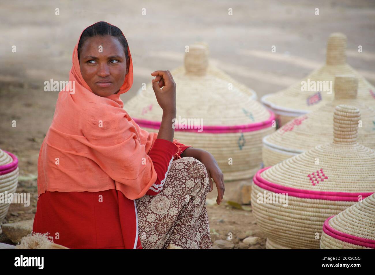 Ethiopian women selling handmade injera baskets at market, Aksum, Tigray, Ethiopia Stock Photo