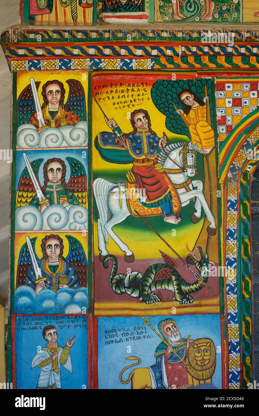 Christian murals on the walls of Enda Iyesus Church, Axum. Aksum. Ethiopia. St George slays the dragon. Stock Photo