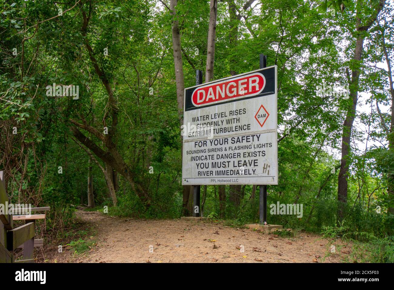 HOLTWOOD, PENNSYLVANIA - SEPTEMBER 9, 2020: A Sign Warns of Flashing Lights and Sirens Being an Indicator of a Siden Rise in Water Level. Located near Stock Photo