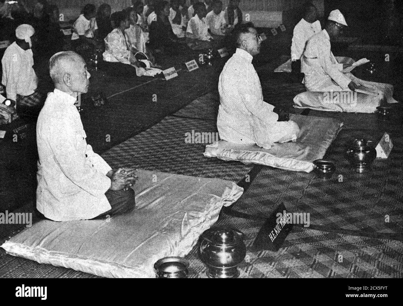 Original Caption: Kou Abhay, chairman of the council of ministers and Sisavang Vatthana, crown prince of Laos and Ba U, president of Burma, at the opening of the Laos-Cambodia session of the Buddhist Council (Chaṭṭa Sangāyanā), 1955-04-28 Stock Photo