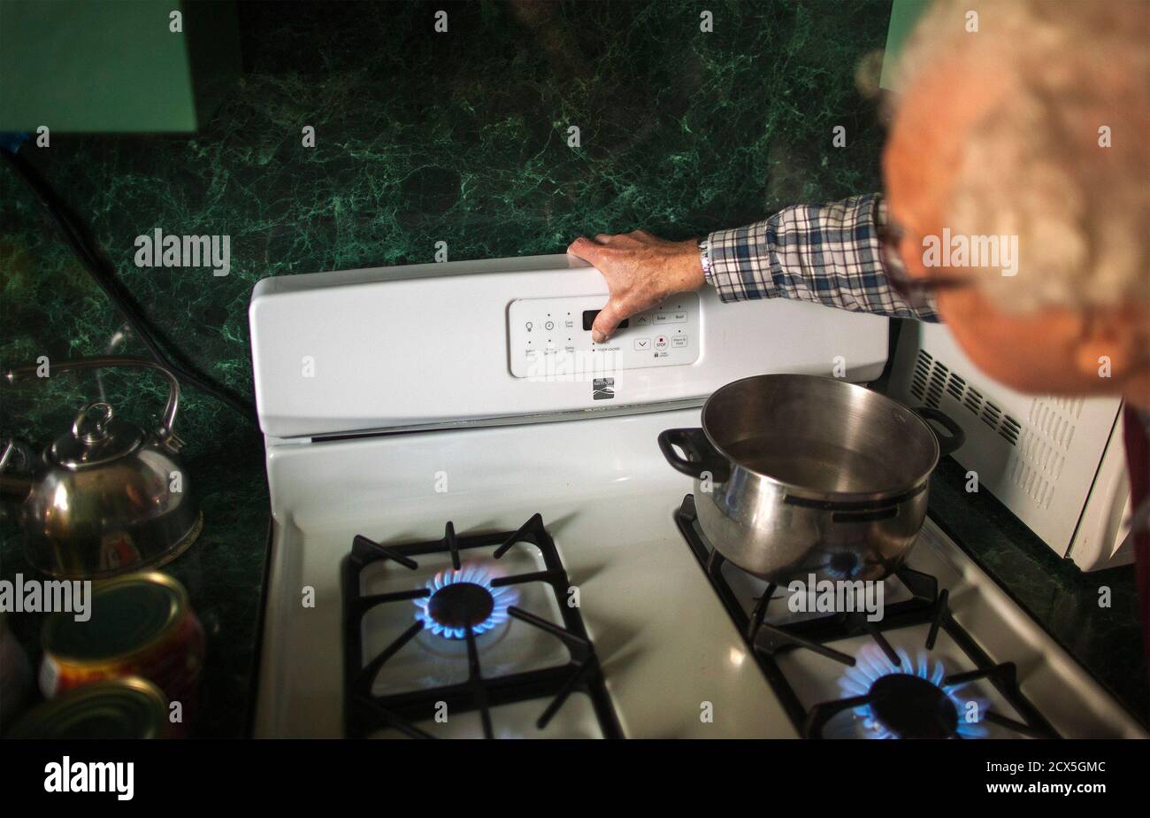 Mac Abrotsky Uses His Gas Stove To Heat His 5th Floor Apartment In A High Rise Apartment Building That Remains Devoid Of Power Heat And Water In The Brighton Beach Neighborhood Of New