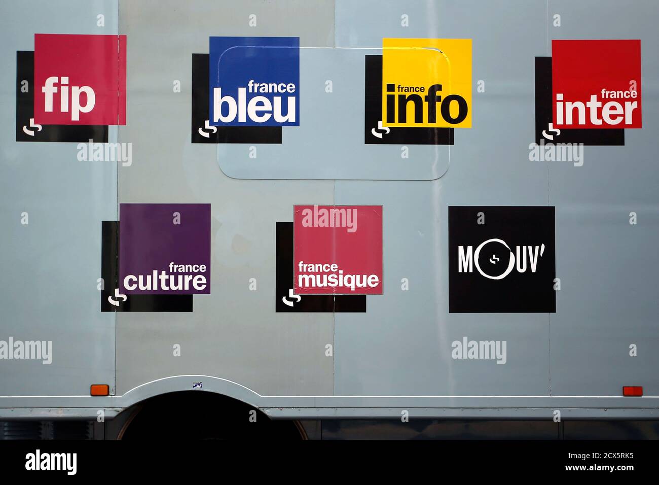 The names of French news, music and cultural radio stations are seen on a  technician's truck outside the Radio France headquarters, known as Maison  de la Radio, in Paris April 1, 2015.