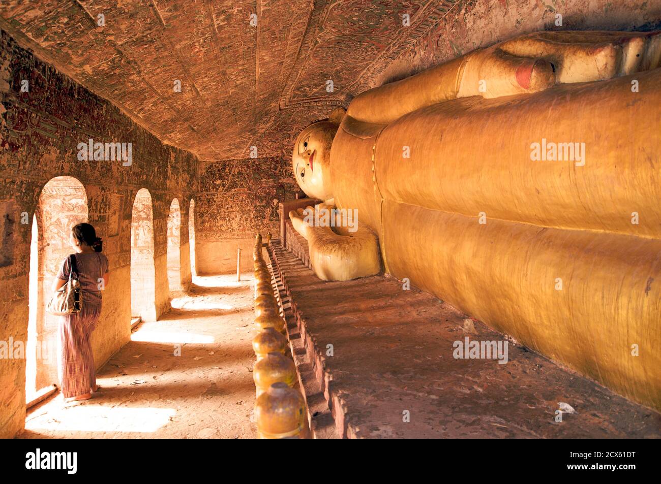 Reclining buddha, Hpo Win Daung caves, near Monywa, Sagaing region, Burma. MODEL RELEASED Stock Photo