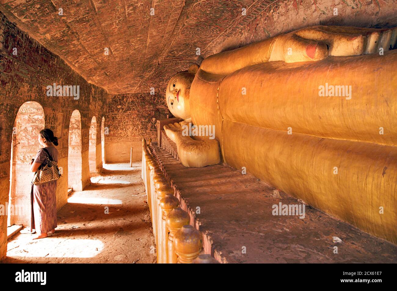 Reclining buddha, Hpo Win Daung caves, near Monywa, Sagaing region, Burma. MODEL RELEASED Stock Photo