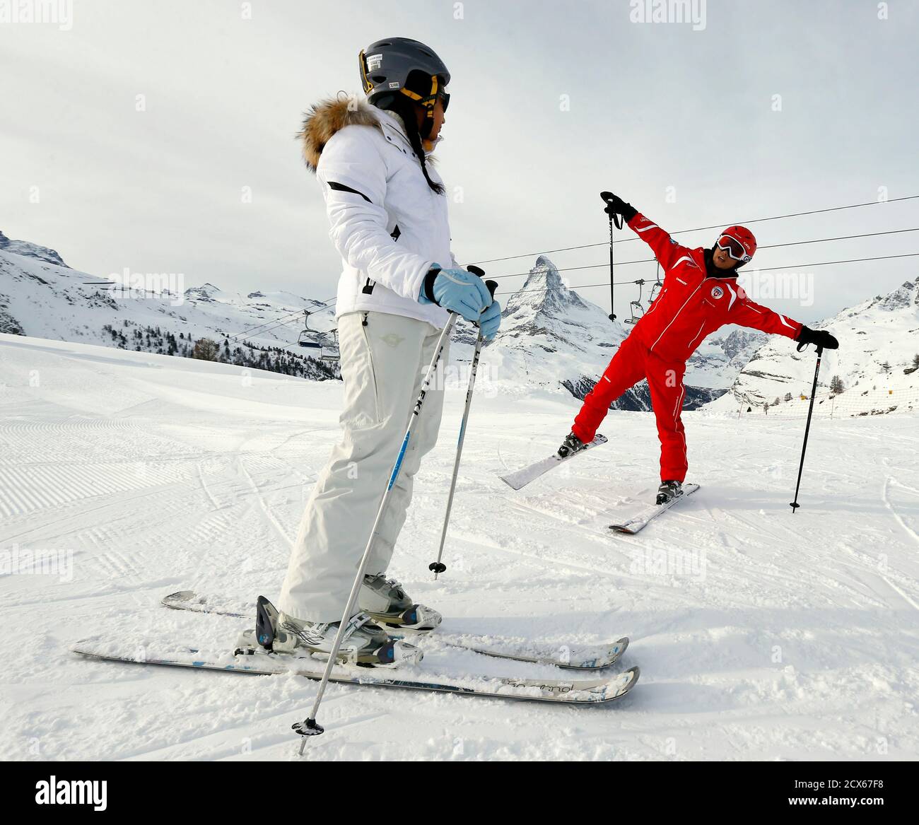 Chinese Ski Instructor Li Yuanliang R Exercises With A Client During A Private Beginner Ski Course In The Alpine Resort Of Zermatt January 6 14 China S Wealthy Have Long Flocked To Switzerland
