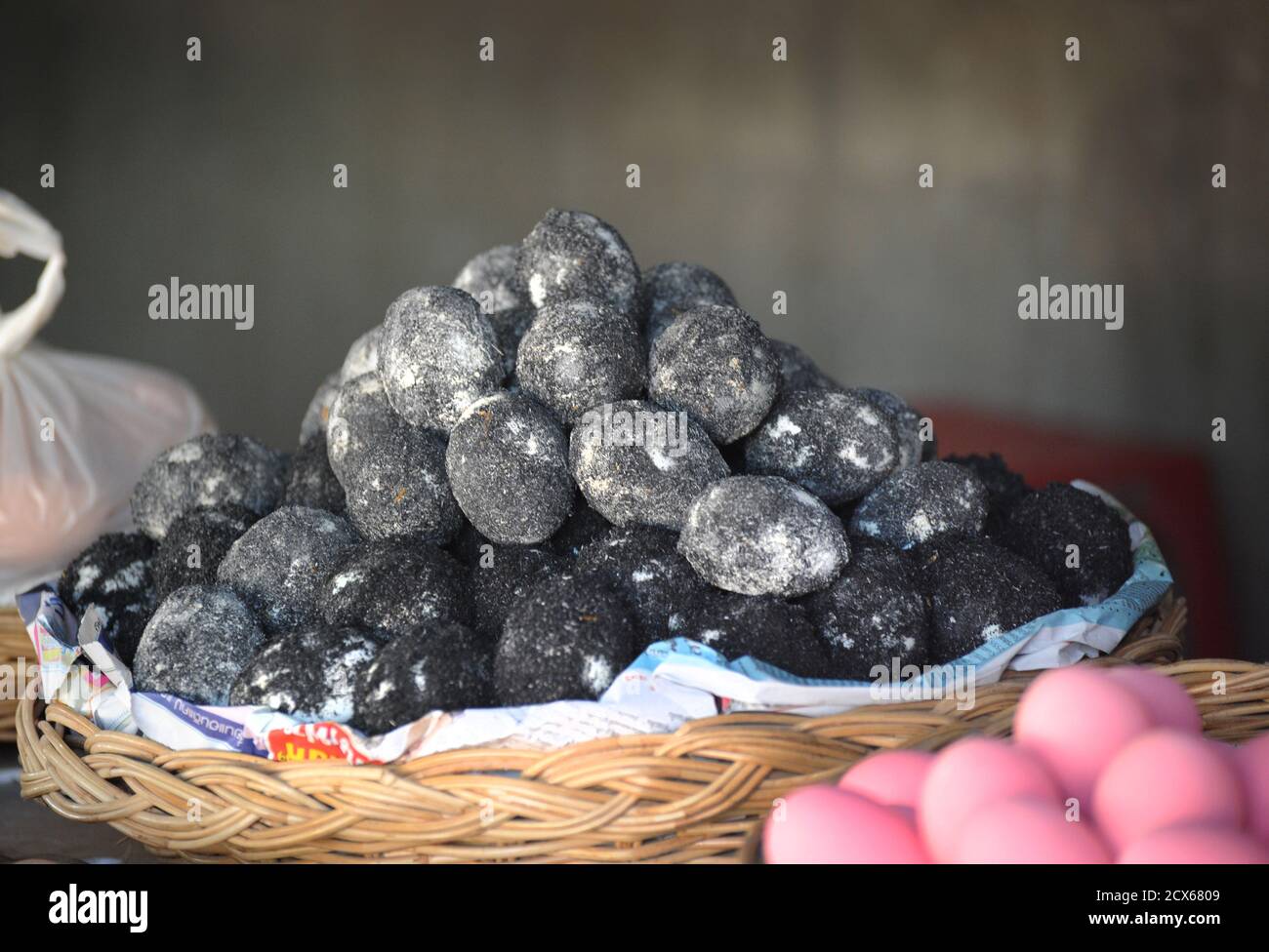 Century eggs or 1000 year eggs. Thailand. A chinese delicacy made by preserving ducks eggs in a mix of charcoal and lime for only around 100 days. Also sold in Cambodia Stock Photo
