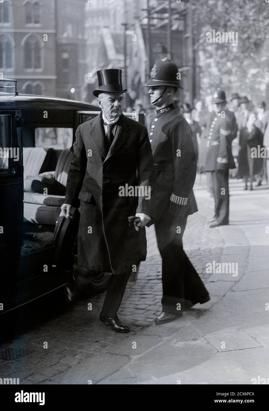 LONDON: Neville Chamberlain, British Prime Minister (1869-1940) arrives at Westminster Abbey in London in 1937/1938 Stock Photo