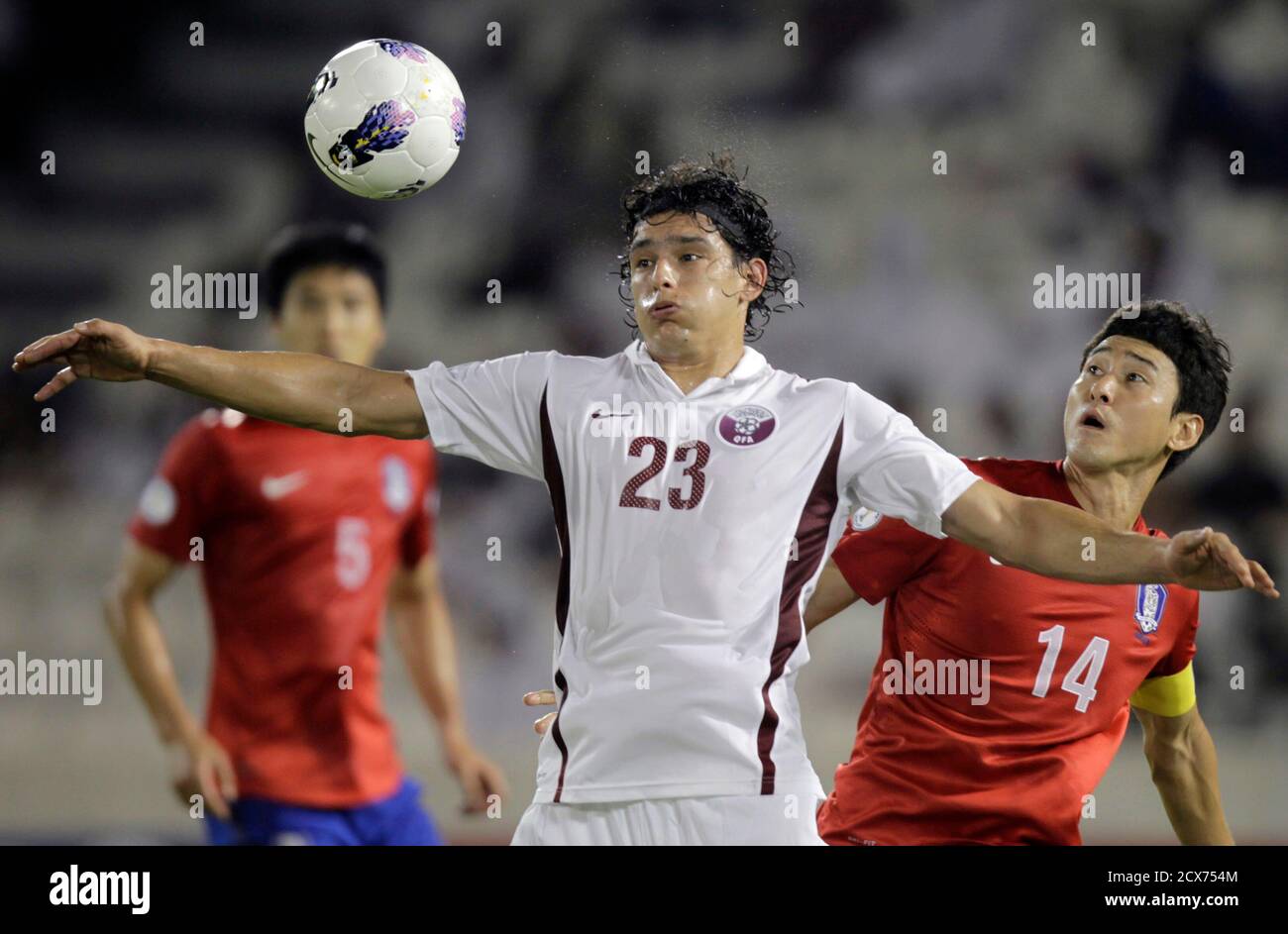South Korea S Lee Jung Soo R Fights For The Ball With Qatar S Sebastian Soria C During Their 14 World Cup Qualifying Soccer Match In Doha June 8 12 Reuters Fadi Al Assaad Qatar s South Korea S Lee Jung Soo R Fights For The Ball With Qatar S Sebastian Soria C During Their 14 World Cup Qualifying Soccer Match In Doha June 8 12 Reuters Fadi Al Assaad Qatar s