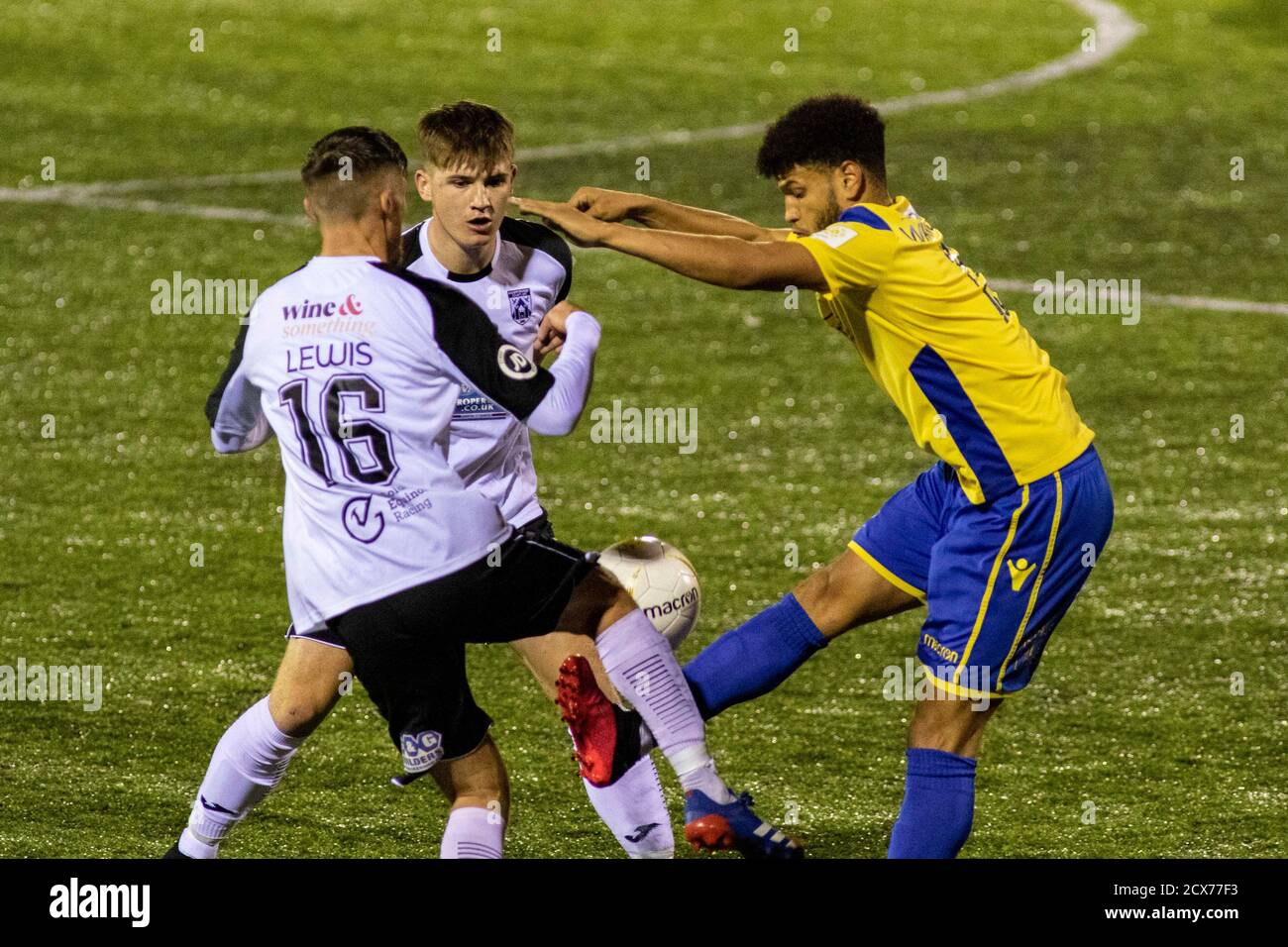 Barry, Wales, UK. 30th Sept, 2020. Theo Wharton of Barry in action against Kieran Lewis of Haverfordwest.  Barry Town United v Haverfordwest at Jenner Stock Photo