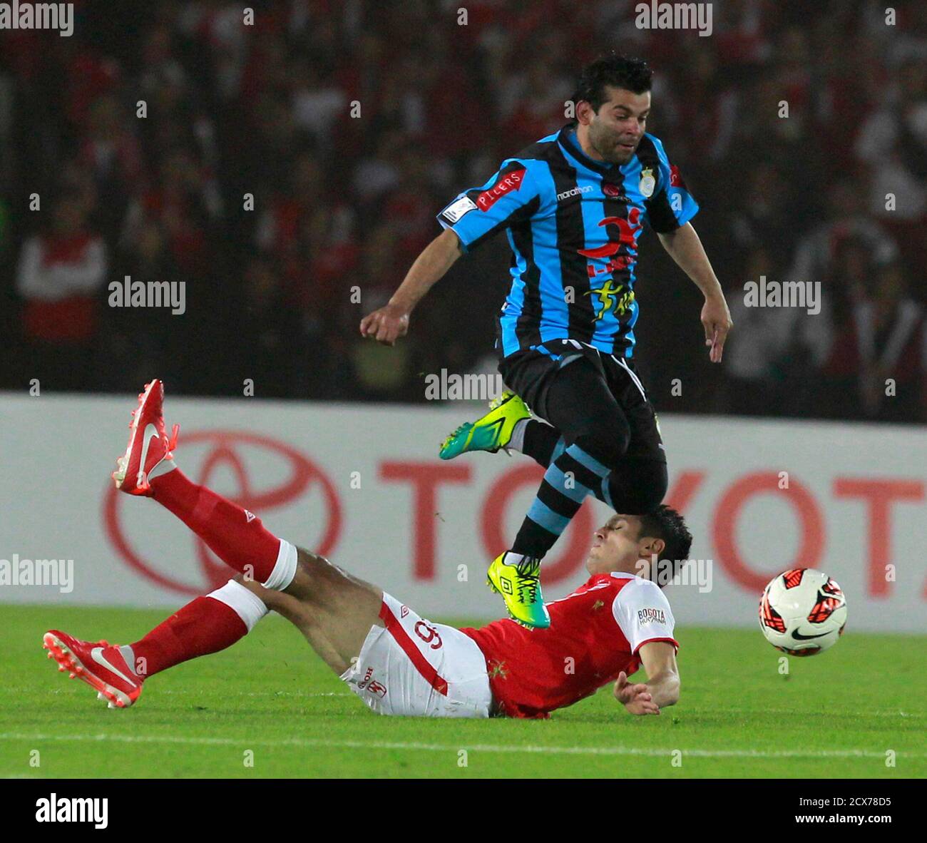 Daniel Torres Bottom Of Colombia S Santa Fe Challenges Fabio Ramos Of Peru S Real Garcilaso During Their Copa Libertadores Soccer Match In Bogota May 28 13 Reuters John Vizcaino Colombia s Sport Soccer Daniel Torres Bottom Of Colombia S Santa Fe Challenges Fabio Ramos Of Peru S Real Garcilaso During Their Copa Libertadores Soccer Match In Bogota May 28 13 Reuters John Vizcaino Colombia s Sport Soccer