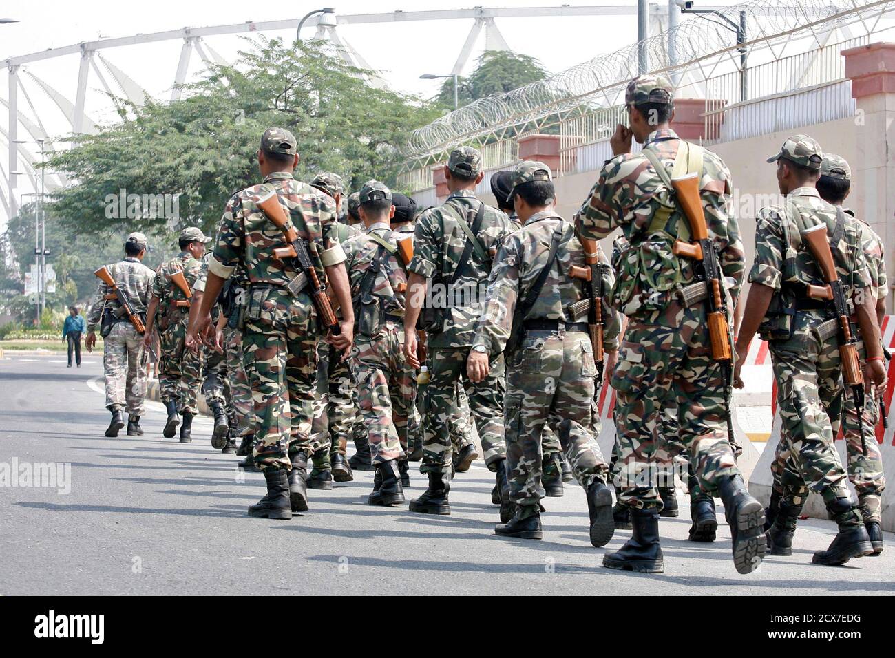 India's paramilitary troopers patrol outside Jawaharlal Nehru stadium in  New Delhi October 1, 2010. New Delhi is due to host the Commonwealth Games  from October 3-14 but several top athletes have pulled