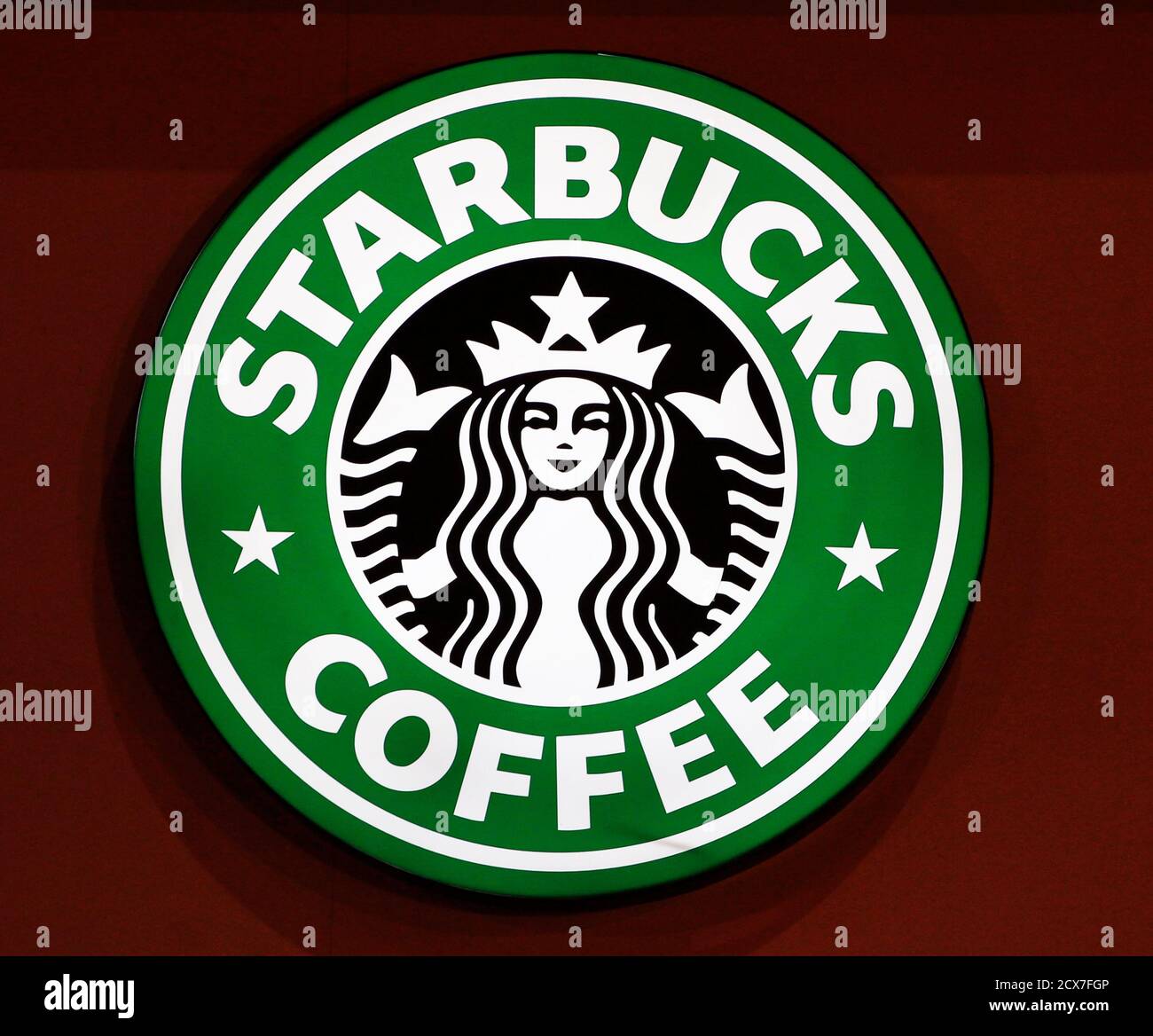 The old Starbucks logo is seen on a coffee store in Paris ...