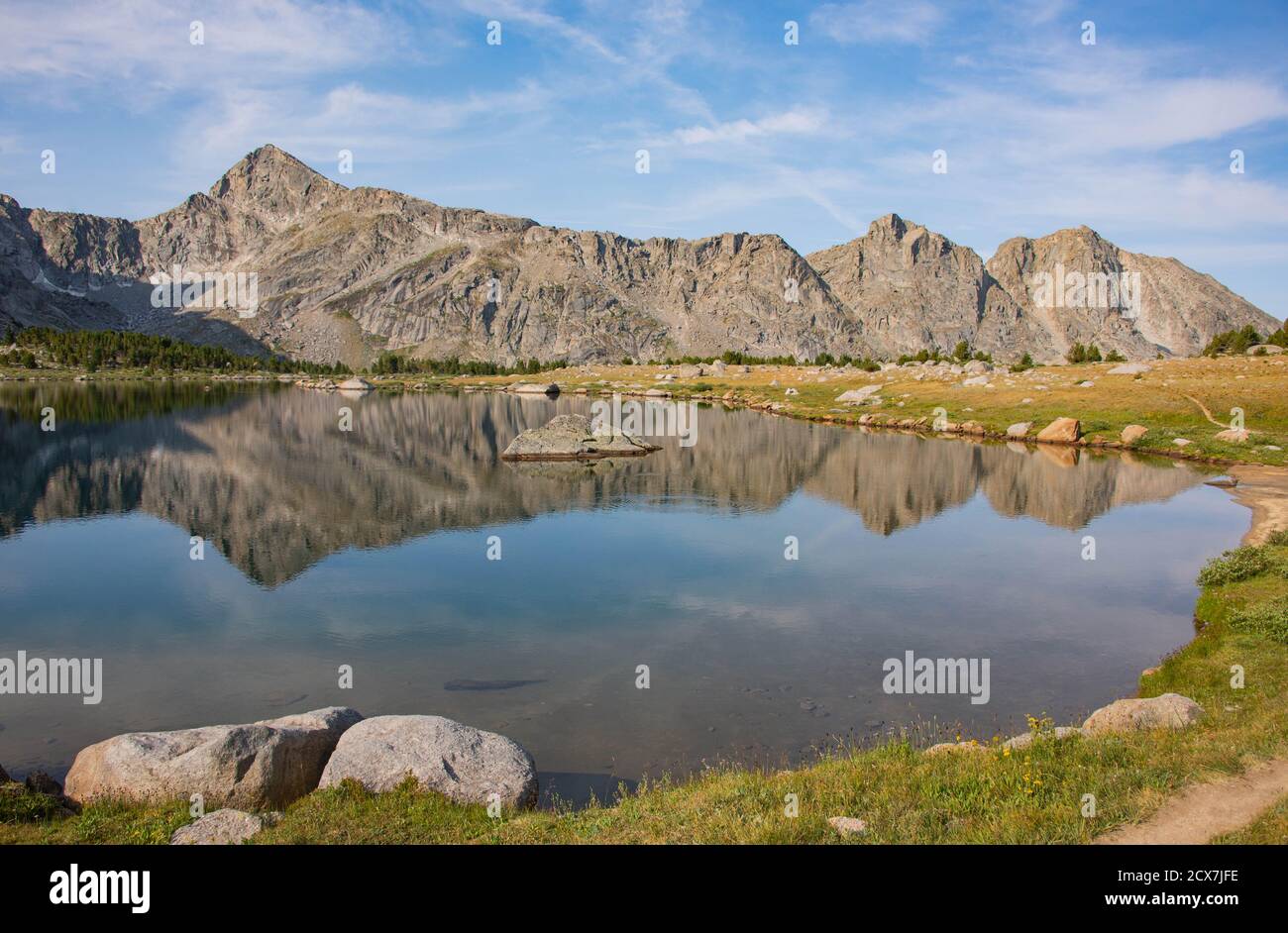 View of the breathtaking Cirque of Towers, seen from Shadow Lake, Wind River Range, Wyoming, USA Stock Photo