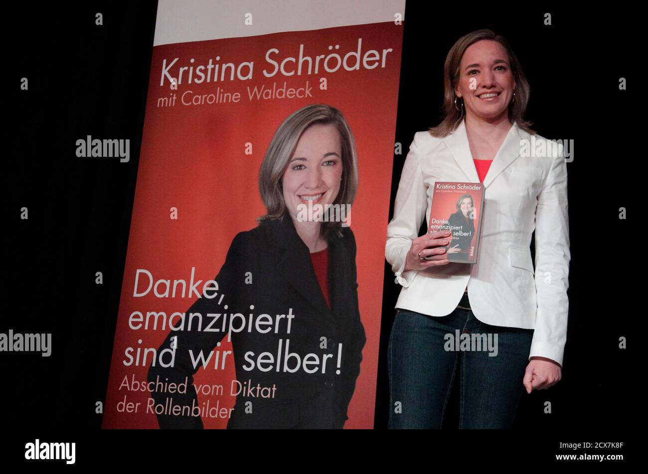 German Families Minister Kristina Schroeder poses as she presents her book 'Danke, emanzipiert sind wir selber!' (Thanks, emancipated we are ourselves) in Berlin, April 17, 2012.  REUTERS/Tobias Schwarz (GERMANY - Tags: POLITICS) Stock Photo