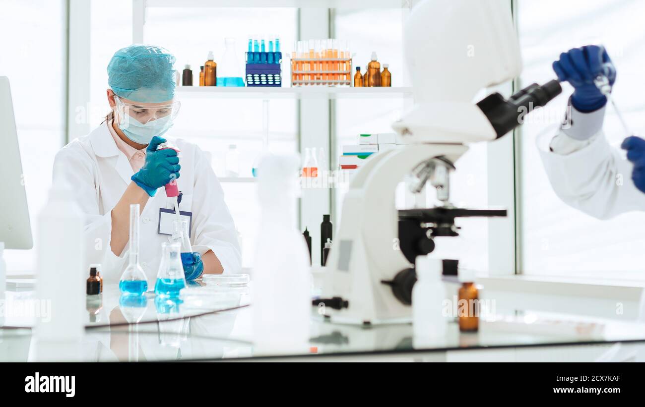 close up. a group of scientists are testing new drugs Stock Photo - Alamy
