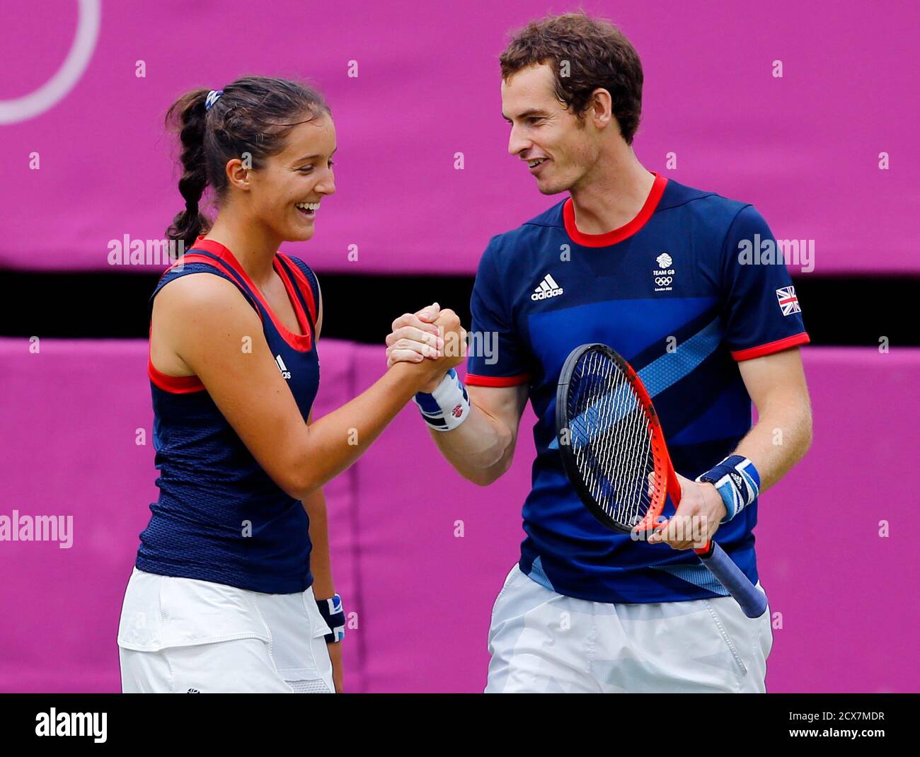 Britain's Laura Robson and Andy Murray celebrate winning their mixed  doubles tennis quarterfinal match against Australia's Samantha Stosur and  Lleyton Hewitt at the All England Lawn Tennis Club during the London 2012