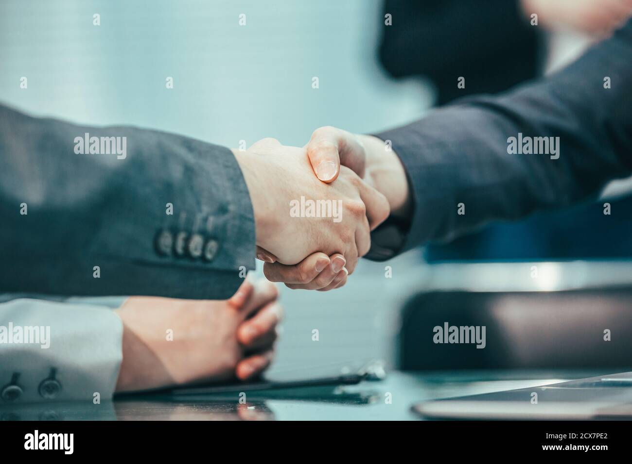 close up. strong handshake of business partners Stock Photo - Alamy