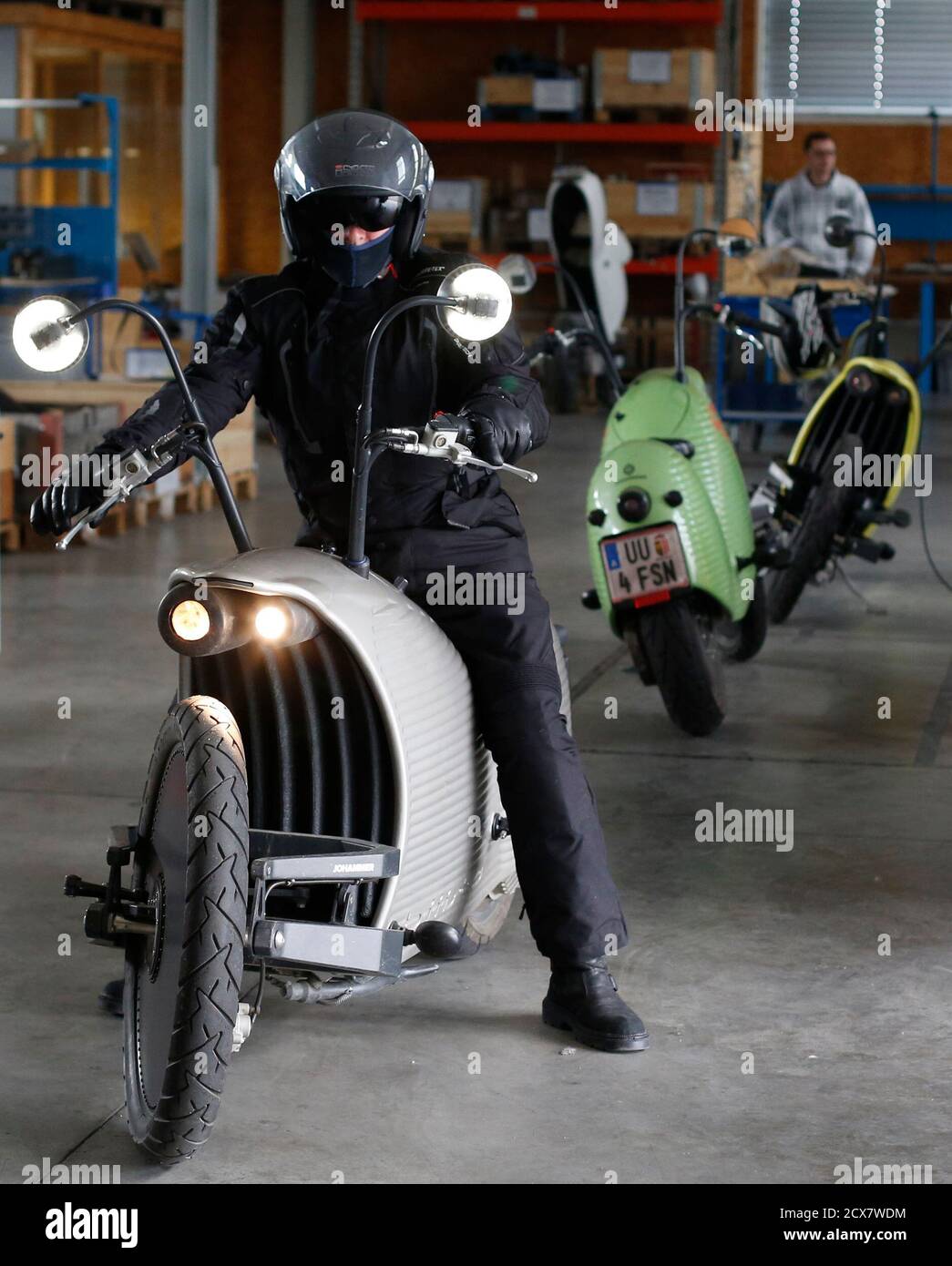 An Employee Of Johammer E Mobility Company Drives A J1 0 Electro Motorcycle Out Of The Company Headquarters In Bad Leonfelden April 23 14 The Johammer J1 0 Is The First Electro Motorbike In The