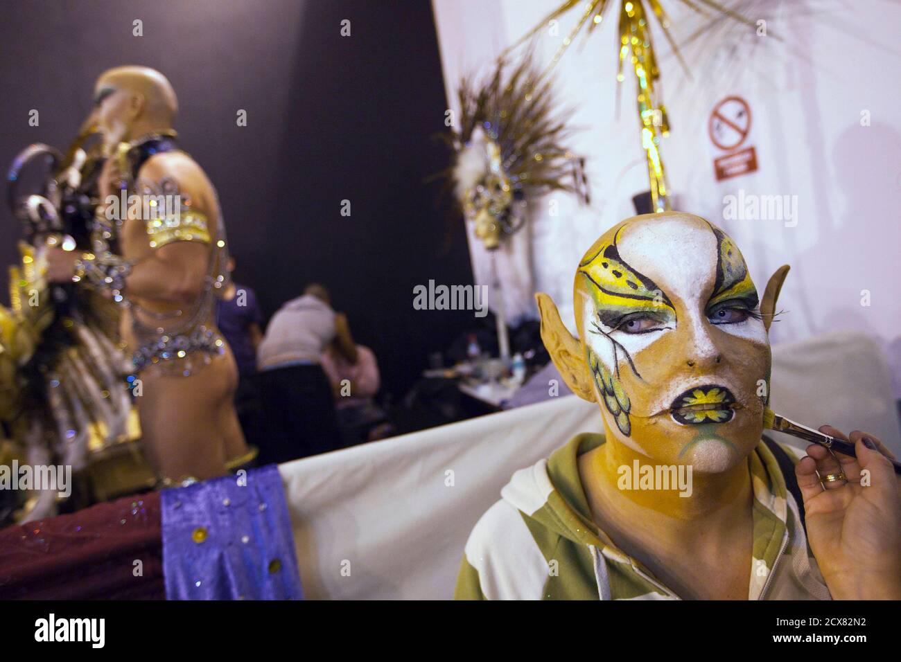 Participant Anemona (R) prepares to perform at a drag queen competition during carnival festivities in Las Palmas on the Spanish Canary Island of Gran Canaria, late March 4, 2011. Picture taken March 4, 2011. REUTERS/Borja Suarez (SPAIN - Tags: SOCIETY) Stock Photo